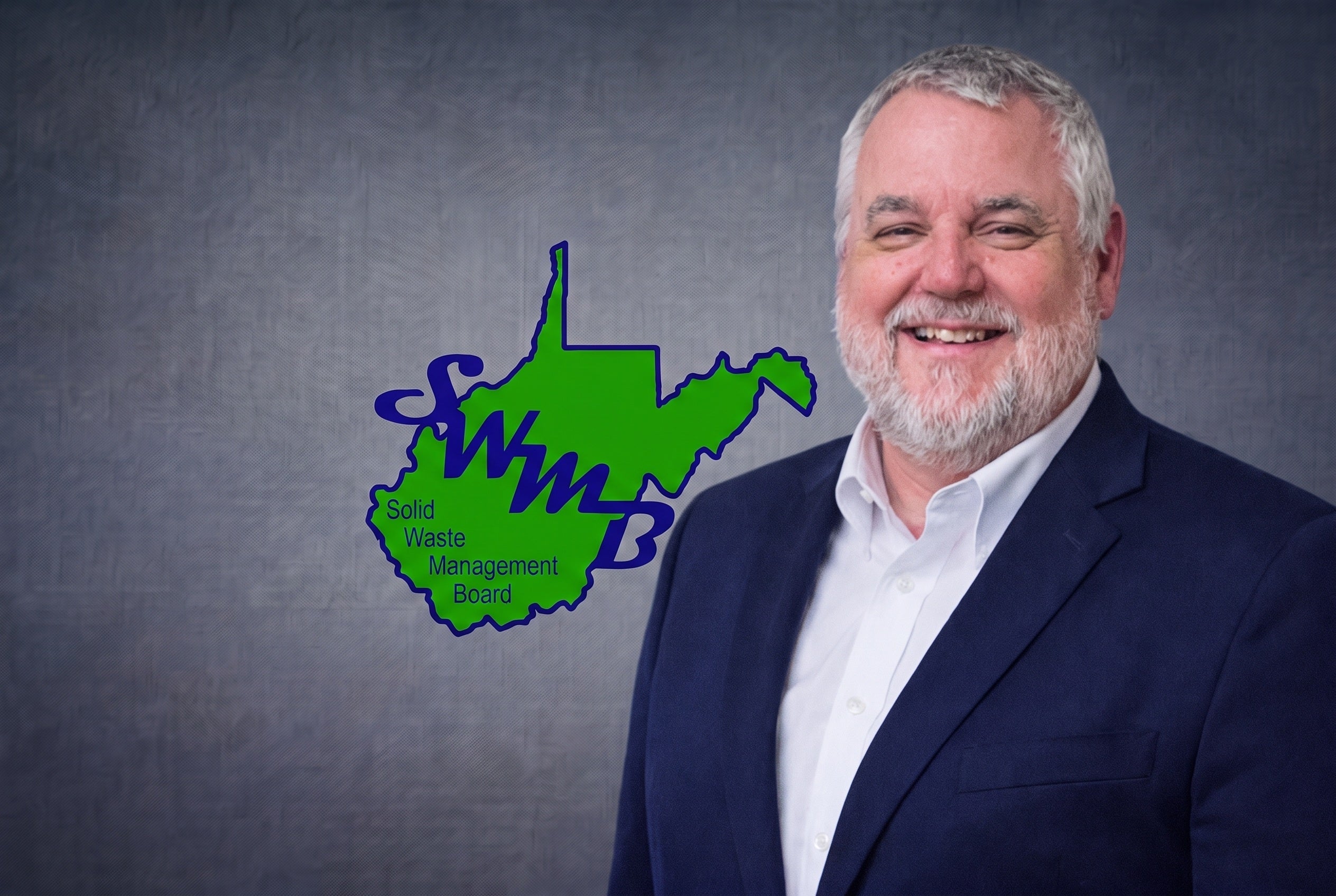 Mark D. Holstine, Executive Director